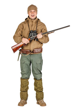 male hunter with double barreled shotgun