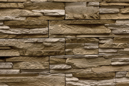 wall lined with decorative stone