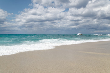 Fototapeta na wymiar Turquoise water on the Riaci beach near Tropea, Italy