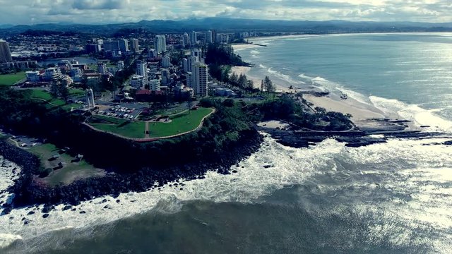 aerial panning shot of coastal boarder between New South Wales and Queensland