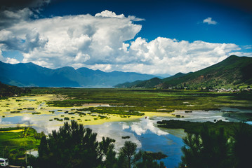 lake between mountains