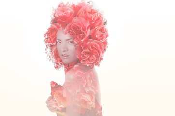 Close up of a sexy beautiful african american girl with an afro hairstyle, with doble exposure of...
