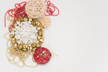 Christmas gift box with ribbon bow  and ball toy and cone on white wooden vintage background