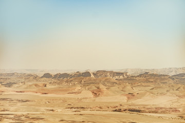 Fototapeta na wymiar Landscape of negev desert in israel. View on scenic outdoor land of sand and mountains.
