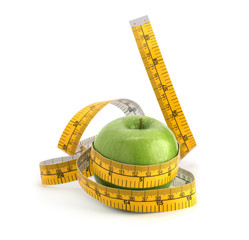 Measuring tape with green apple isolated on white