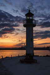 Lighthouse at sunset in port Burgas, Black Sea, Bulgaria.