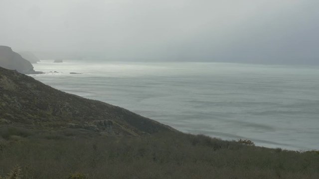Cliffs and beaches of Devon and Cornwall on a wet rainy day