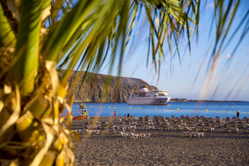 Ferry ship on tropical beach