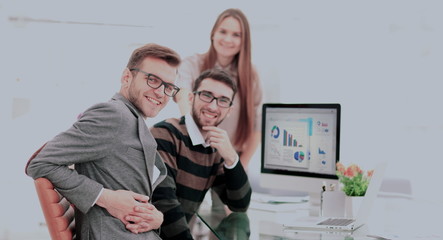 Successul business team working in an modern sunny office. Analy