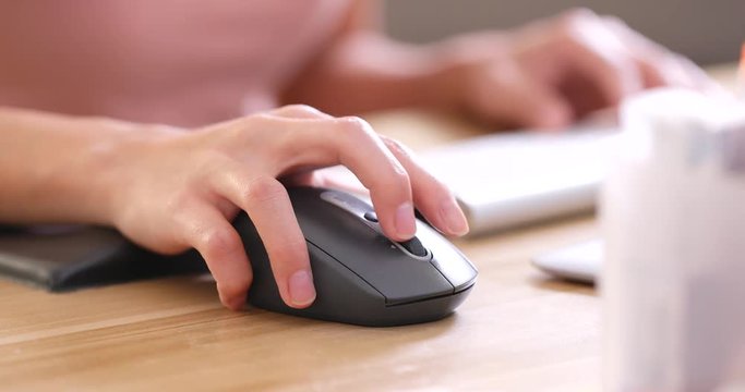 Woman working on laptop computer