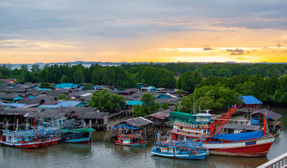 Fishing village on the river in rural Thailand.