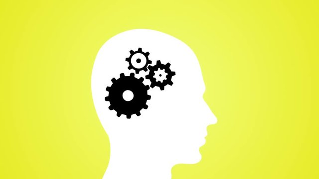 cogs turning thinking concept with silhouette of man loop yellow