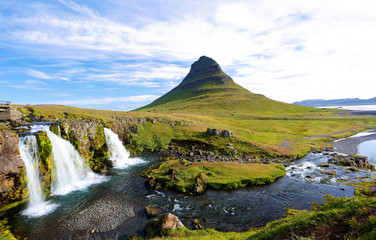 Kirkjufellfoss at Sunrise, Iceland. The fall also known as Church Mountain Falls located at  Kirkjufell mountain on the west side of Iceland.