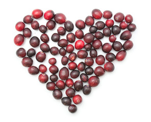 Cranberries heart love isolated on white background top view.