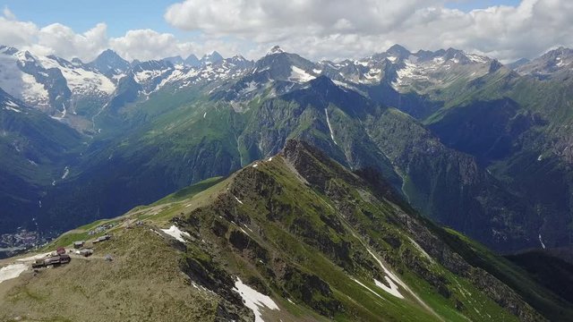 Mountain landscape in the summer time. Beautiful natural video of mountains from air