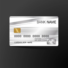 Modern credit card template design. With inspiration from the abstract. Silver and white color on the blcak background. Vector illustration.Glossy plastic style.