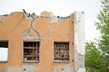 window in an old wall of a house destined for demolition
