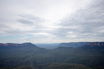 a scenic view of blue mountain