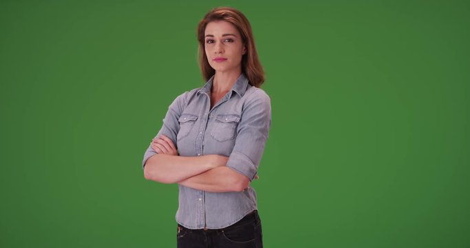 Young white ranch girl on green screen. On green screen to be keyed or composited. 