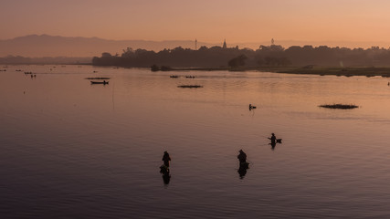 Naklejka premium Path of Life of fisherman at river side in Mandalay, Myanmar with wonderful sun light at morning.