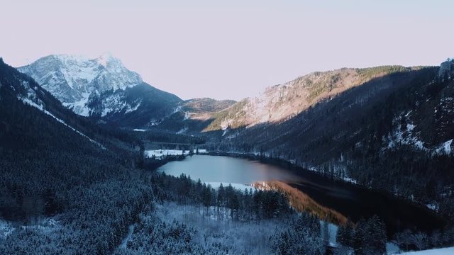 aerial flight over winter landscape in ebensee