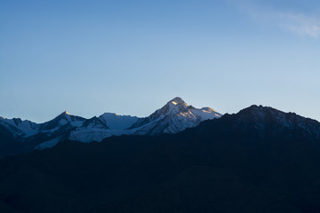 Fototapeta na wymiar Mountains in blue shade at evening time, Ladakh Region, India