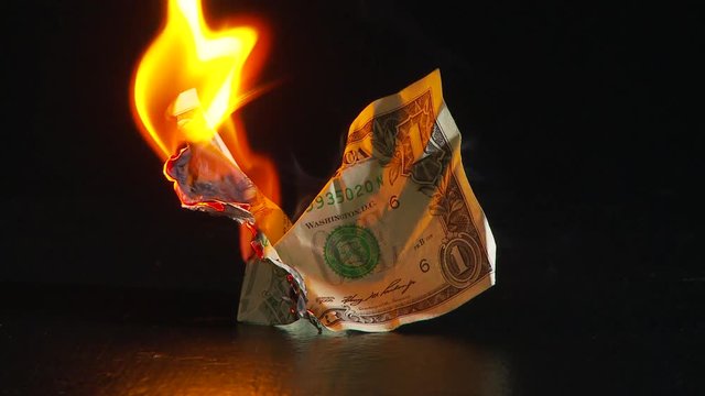 dollar bill burning