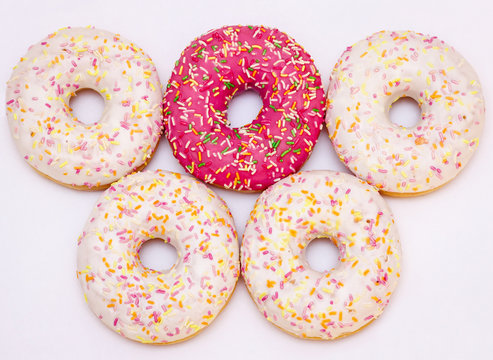 Olympic donuts on a white background