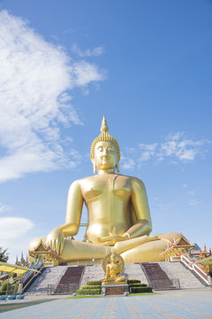 Golden Buddha statue at Wat Muang temple in Angthong, Thailand