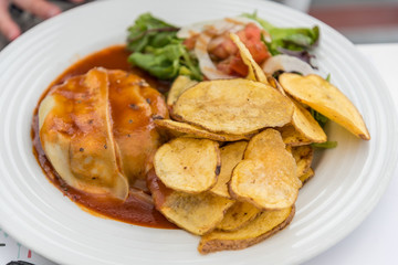 Quinta com Quiejo a typical dish consisting of a meat burger and Azorean cheese in Ponta Delgada on the island of Sao Miguel in the Azores, Portugal