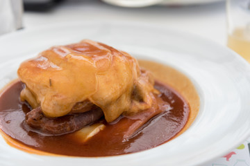 Acoreaninha a typical dish consisting of a meat burger, sausages and Azorean cheese in Ponta Delgada on the island of Sao Miguel in the Azores, Portugal