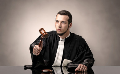 Oldscool young judge in gown