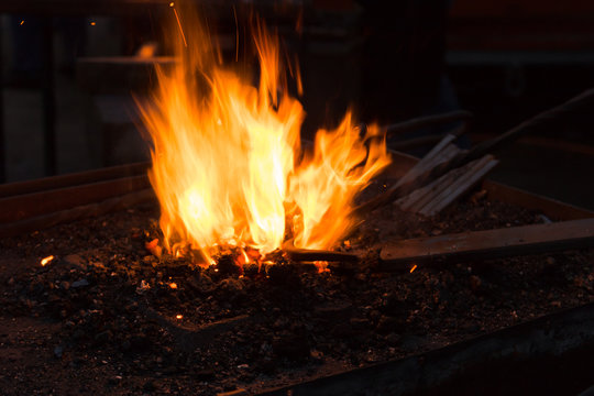 Blacksmiths coals burning for iron work
