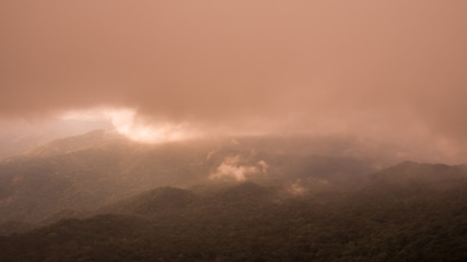 Fototapeta premium Beautiful Natural Sunset Sunrise Over Khao Mokoju Summit Mokoju Mountain, Mae Wong National Park, Thailand.