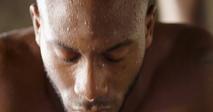  00:14 | 00:17 1&times;  A muscular and sweaty man is training at the gym by lifting the gym weights to strengthen his muscles. Concept of: workout, workout, power, supplements, fitness