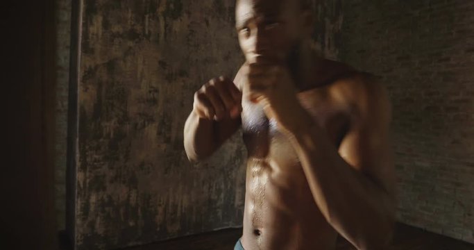  00:14 | 00:17 1&times;  A muscular and sweaty man is training at the gym by lifting the gym weights to strengthen his muscles. Concept of: workout, workout, power, supplements, fitness