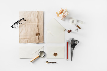 Blank art and craft stationery on white paper background. Branding mockup. Flat lay.