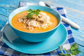 Tomato soup with rice.