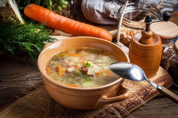 Pea soup with vegetables and bacon.