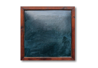 Empty wooden frame on the wall. Blackboard inside and white background, space for text.