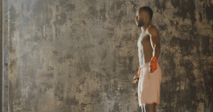  00:14 | 00:17 1&times;  A muscular and sweaty man is training at the gym by lifting the gym weights to strengthen his muscles. Concept of: workout, workout, power, supplements, fitness