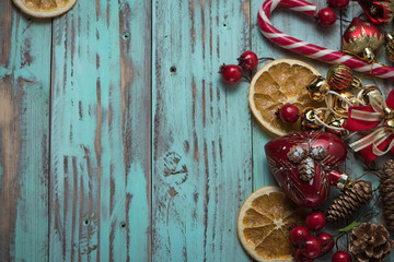 New year's background on a light geen desk decorated with Christmas decoaration and candles. Bright colored Horizontal background symbolizes the new year celebration. Copy space 7