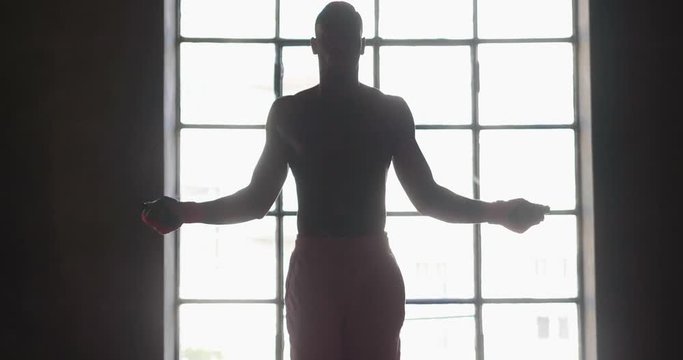  00:14 | 00:17 1&times;  A muscular and sweaty man is training at the gym by lifting the gym weights to strengthen his muscles. Concept of: workout, workout, power, supplements, fitness
