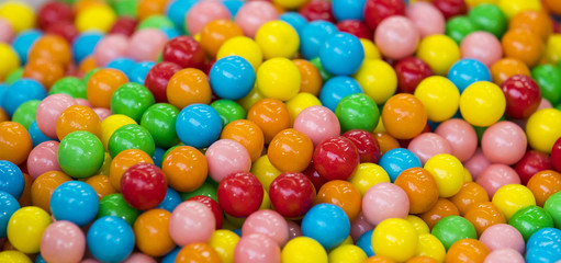 Fototapeta na wymiar Background of multi-colored round sweet candies