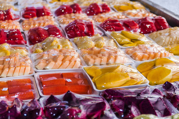 Sliced fruit on the market counter