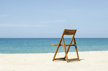 sunglasses and beach chair 