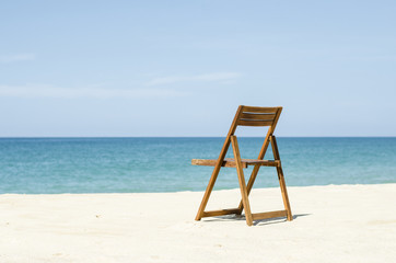 sunglasses and beach chair 