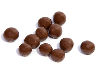 almonds in chocolate glaze on a white background