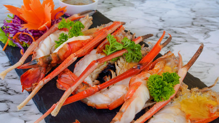 Close up of grilled Giant River Prawn with fresh Curly Parsley