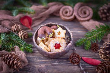 Merry Christmas and Happy New Year. Christmas cookies in a ceramic bowl
